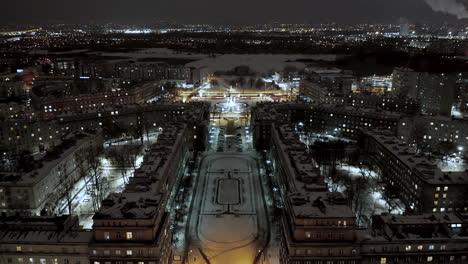 Aerial-view-of-Nowa-Huta-at-night-during-Christmas-time,-Krakow,-Poland