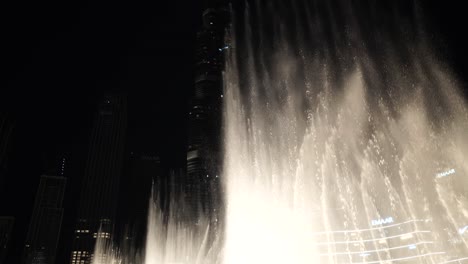 Downtown-Dubai-UAE,-Music-Fountain-and-Burj-Khalifa-Skyscraper-in-Lights