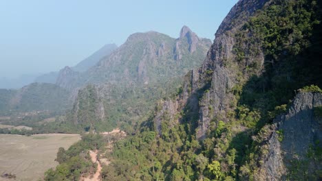 Limestone-formations-in-rural-countryside,-Laos