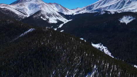 Boreas-Mountain-Pass-Breckenridge-Colorado-aerial-drone-cinematic-Backcountry-blue-clear-sky-North-Fork-Tiger-Road-Bald-Rocky-Mountains-Keystone-winter-fresh-snow-daytime-forward-upward-motion
