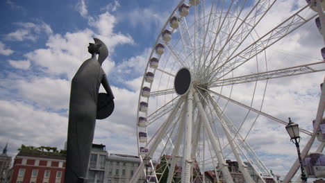 The-View---Ferris-Wheel-Situated-at-Steenplein,-Antwerp,-Flemish-Region,-Belgium,-Europe---Low-Angle-Shot