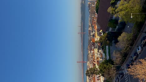 Vertical-timelapse-view-of-sailing-boats-moving-over-the-Tagus-river-in-Portugal