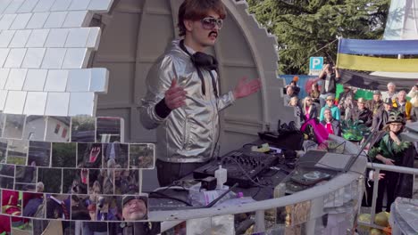 Hand-held-footage-of-a-DJ-at-the-45th-Leiferer-Fasching---Carnevale-di-Laives-carnival-parade-in-Leifers---Laives