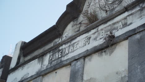 An-old-mausoleum-in-a-quiet-cemetery-reads-"Pure-in-heart