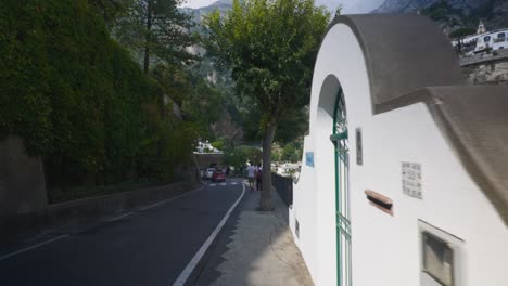 Looking-Between-Trees-and-Out-Over-Vast-Hills-|-Near-Scenic-Mountain-Cliffside-In-Positano-Italy-in-Summer,-4K