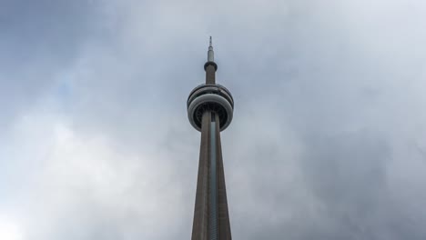 Clouds-Moving-Over-CN-Tower,-Canadian-National-Tower-In-Downtown-Toronto,-Canada