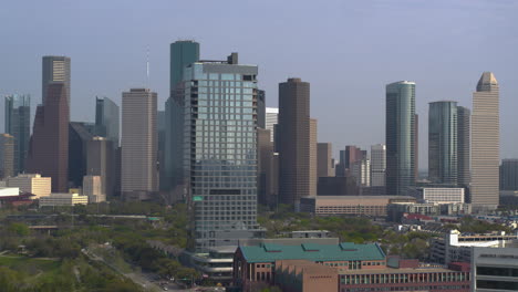 Pulling-away-drone-shot-of-the-downtown-Houston-area