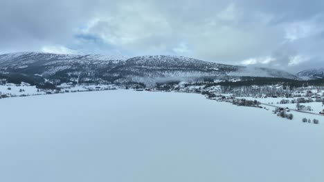 Winter-morning-above-Oppheimsvatnet-lake-in-Voss-Norway,-aerial