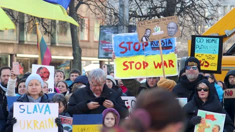 Crowd-at-protest-against-Russian-invasion-of-Ukraine-in-Sweden,-slomo