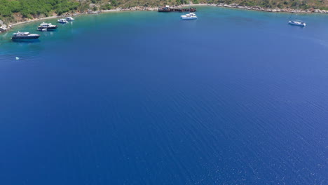 Aerial:-Drone-reveal-shot-of-Peristera-island-shipwreck-near-Alonnisos,-Sporades,-Greece-during-summer