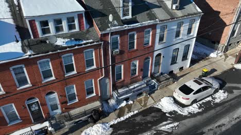 Aerial-top-down-shot-of-american-housing-row-in-winter-snow