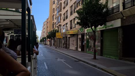 Touristic-Ride-on-Streets-of-Elche,-Spain