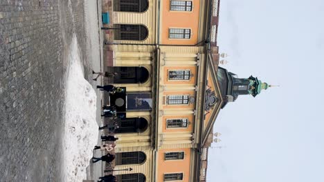 Swedish-Academy-and-Nobel-Prize-Museum-building-on-snowy-day,-vertical