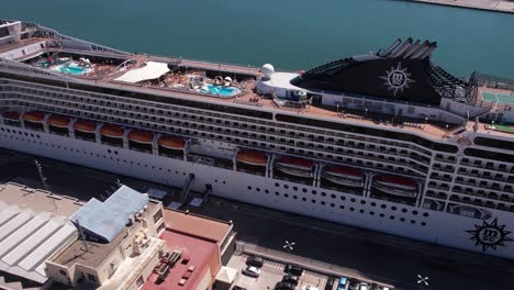 Drone-Shot-of-MSC-Armonia-Cruise-Ship-in-Harbor-Terminal-of-Cádiz-Spain