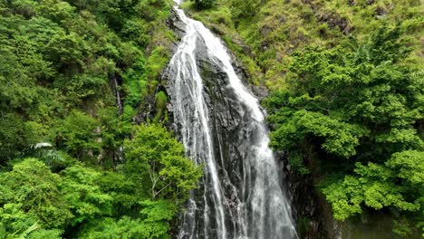 Water-flows-over-rocky-terrain-creating-picturesque-natural-scenery