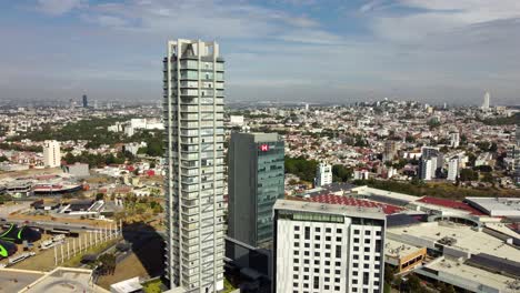 Torres-Uma-Apartment-tower-and-HBSC-Bank-in-Puebla-City-at-sunset