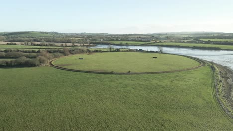 People-Riding-Horses-On-The-Bank-Of-Blackwater-River-In-County-Cork,-Ireland