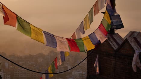 Close-shot-of-prayer-flags-at-the-main-entrance-to-the-Monkey-Temple-at-sunrise,-Kathmandu,-Nepal