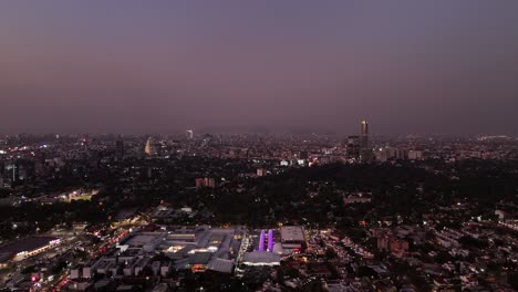 Aerial-view-of-a-pastel-sunset-falling-over-Coyoacan-in-Mexico-City