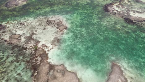 Aerial-tilt-up-bird-view-reveals-southern-barrier-los-roques-venezuela