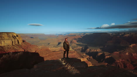 One-man-standing-at-Grand-Canyon,-Arizona