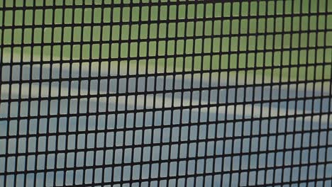 Primer-Plano-De-Una-Red-De-Tenis-Profesional-Diseñada-Para-Torneos-Atp,-Fabricada-Con-Material-De-Goma-Duradero