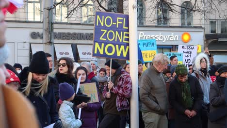 No-Fly-Zone-sign-at-rally-against-Russian-war-in-Ukraine,-static