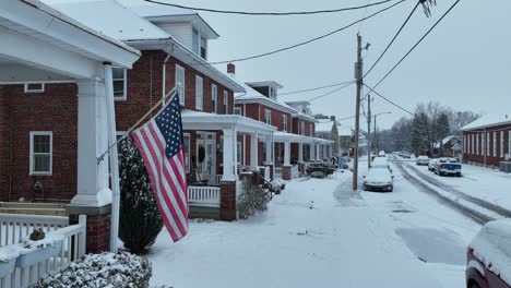 American-Flag-in-front-of-house-in-american-neighborhood