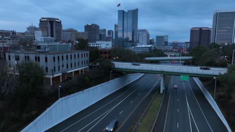 Aerial-flyover-of-an-overpass-and-highway-in-Richmond,-Virginia