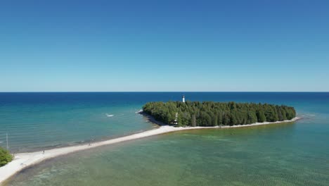 Drone-aerial-view-of-a-land-bridge-between-an-island-and-mainland