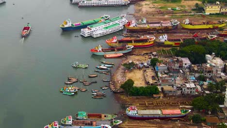 Aerial-View-Of-A-Shipyard-With-Abandoned-Ferry-Ships-For-Repair-Near-Dhaka-City,-Bangladesh,-South-Asia