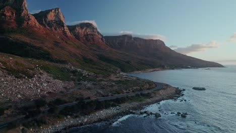 Scenic-Drive-Of-Victoria-Road-With-12-Apostles-And-Table-Mountain-National-Park-In-Cape-Town,-South-Africa