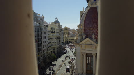 As-the-clock-nears-2-PM,-the-camera-scans-the-view-at-Estacion-del-Nord,-capturing-the-growing-crowd-and-energy