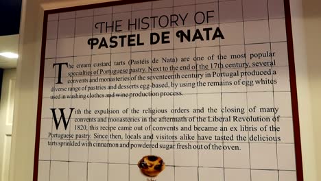 Informational-panel-detailing-the-history-of-Pasteis-de-Nata