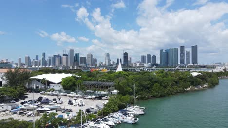 Aerial-View-of-Downtown-Miami-From-Yachting-Club-Marina-With-Cruise-Ship-Port-in-Background,-Dolly-Drone-Shot,-Florida-USA