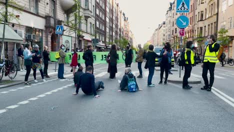 Protesters-at-sit-in-demonstration-by-Extinction-Rebellion,-Stockholm