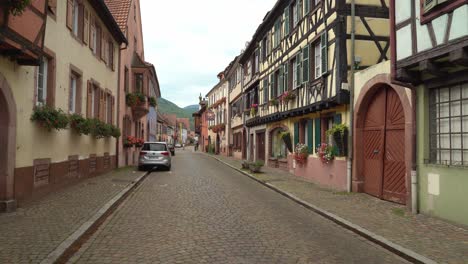 Main-Street-of-Kientzheim-Village-with-Two-People-Walking-in-the-Distance