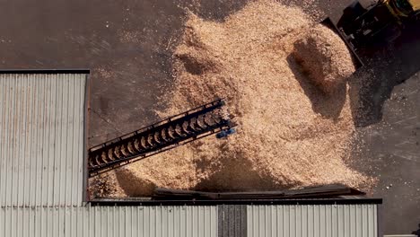 Transporting-Wood-Chips-With-Conveyor-And-Loader-At-Sawmill