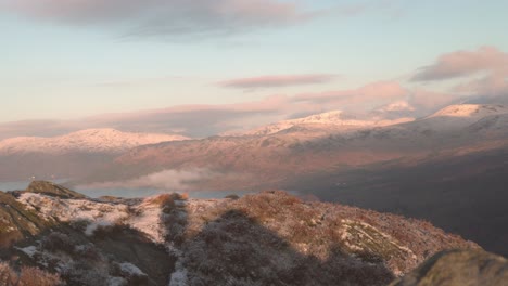 Static-shot-of-snowy-mountains-in-the-Trossachs-National-Park-in-Scotland