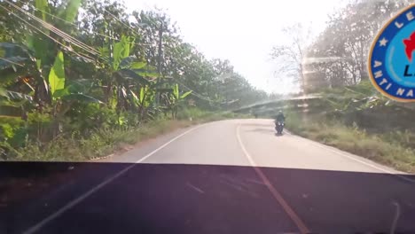 Pov-from-inside-a-bus-in-Cepu,-Blora,-Central-Java,-Indonesia