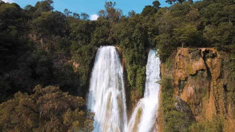 Spectacular-waterfalls-with-surreal-turquoise-waters-in-the-Mexican-rainforest,-drone-footage