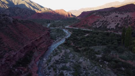 Sunlight-and-shadow-in-mountain-valley,-Mipanda-River-in-Argentina