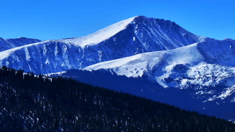 Winter-Quandary-Peak-fourteener-Ten-Mile-Range-Breckenridge-Colorado-aerial-drone-Boreas-Hoosier-Pass-Blue-River-Mt-Lincoln-clear-blue-sky-morning-Rocky-Mountain-landscape-downward-movement
