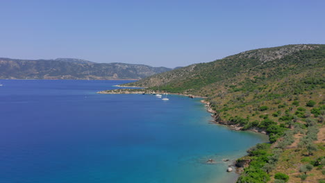 Aerial:-Flying-towards-Alonnisos-shipwreck-in-Peristera-island,-Sporades,-Greece-during-summer