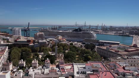Aerial-View-of-MSC-Armonia-Cruise-Ship-in-Port-of-Cádiz-Spain,-Drone-Shot