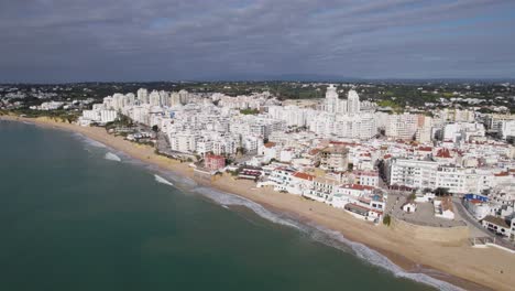 Aerial-Coastal-vista-of-Armação-de-Pêra,-Algarve-Portugal