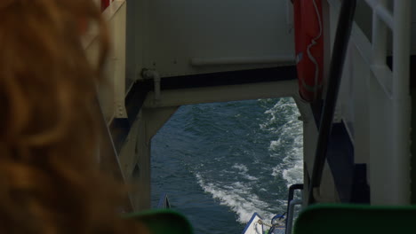 Person's-POV-Looking-On-Backwash-Of-Boat-Cruising-In-The-Sea