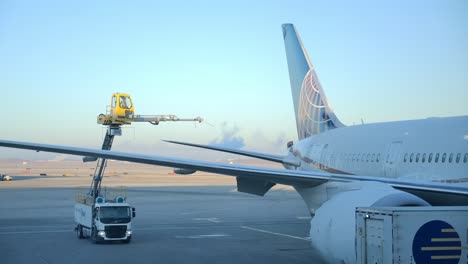 Preflight-De-Icing-of-a-United-Airliners-Airplane-at-the-Gate---Static