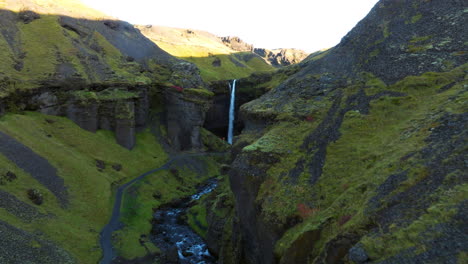 Idyllic-Landscape-Of-Kvernufoss-Waterfall-In-Iceland---Drone-Shot