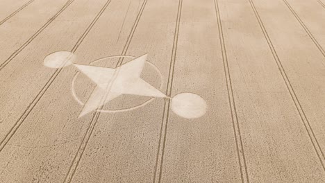 Aerial-view-of-crop-circle-in-brown-farm-field-speculated-to-be-made-by-aliens